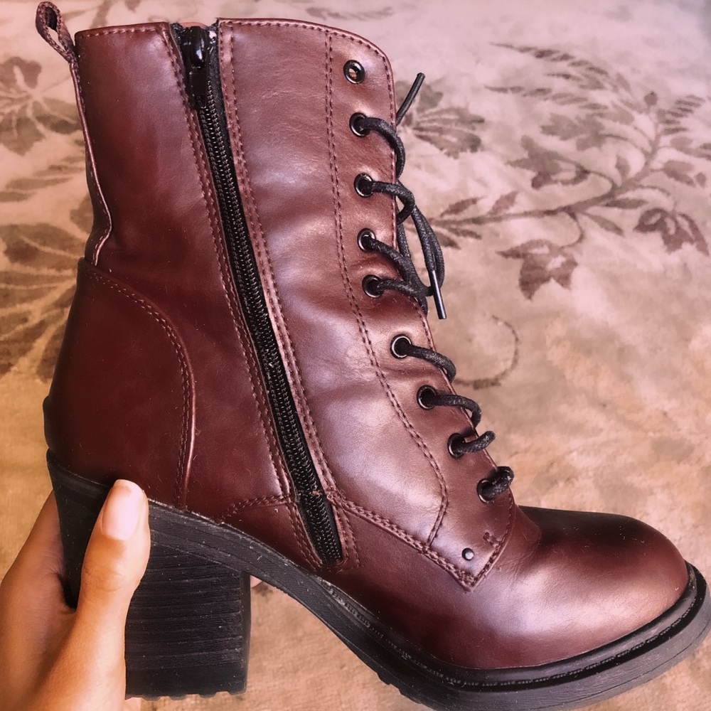 High heeled, lace up maroon combat boots